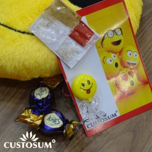 Alternative view of Smiley Rakhi inclusive of Tilak-Chandan-Chawal-Mishri and additional Chocolates.